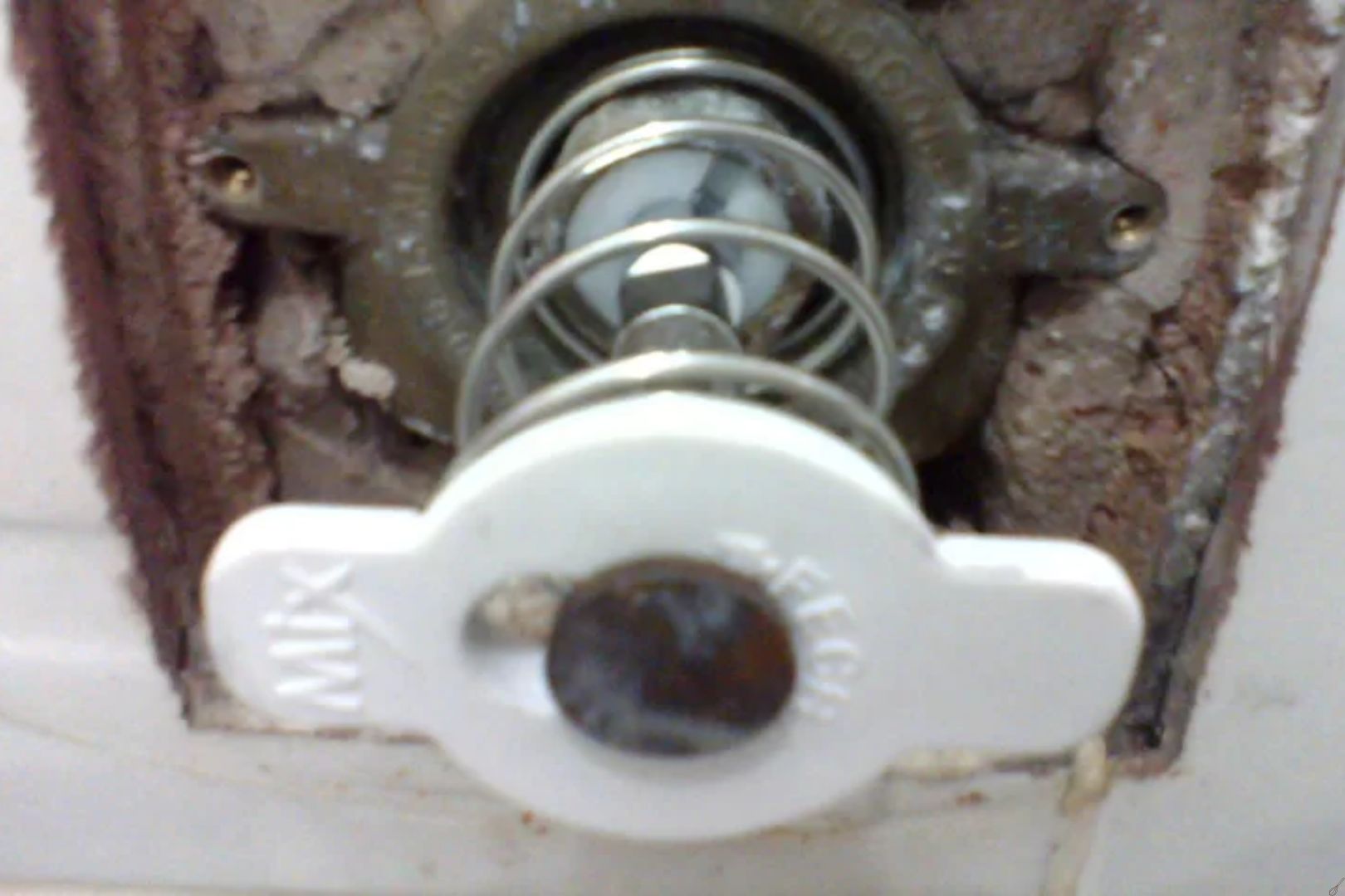 como ajustar a valvula de descarga antiga